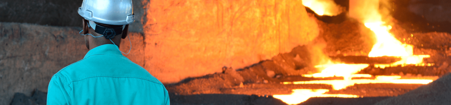 Samancor Chrome employee working near a furnace